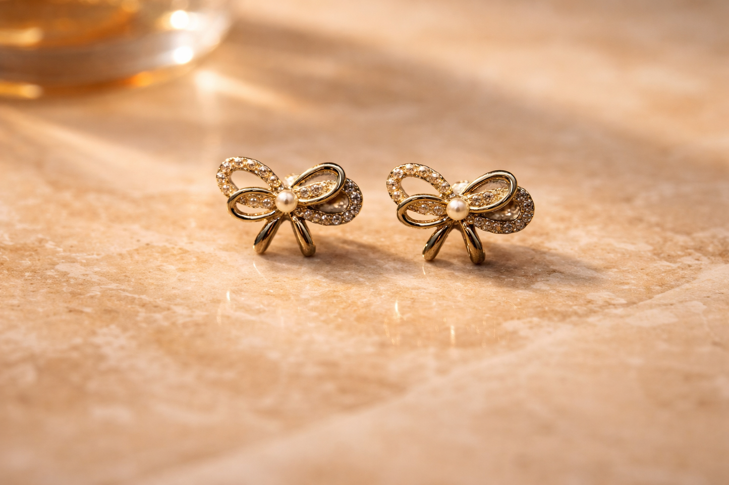 Golden Sparkle Bow Pearl Stud Earrings