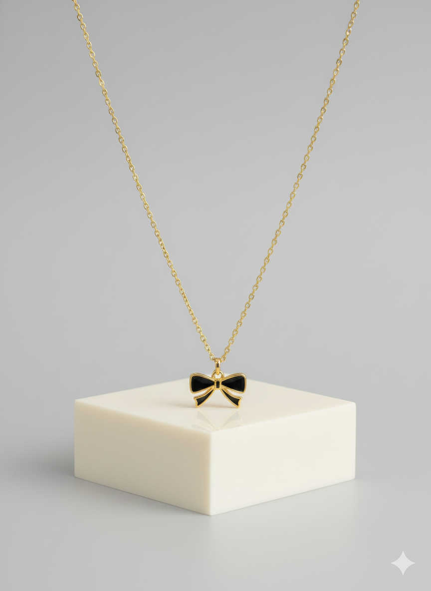 MODFUSE Elegant Black Bow Pendant Necklace – Gold Finish